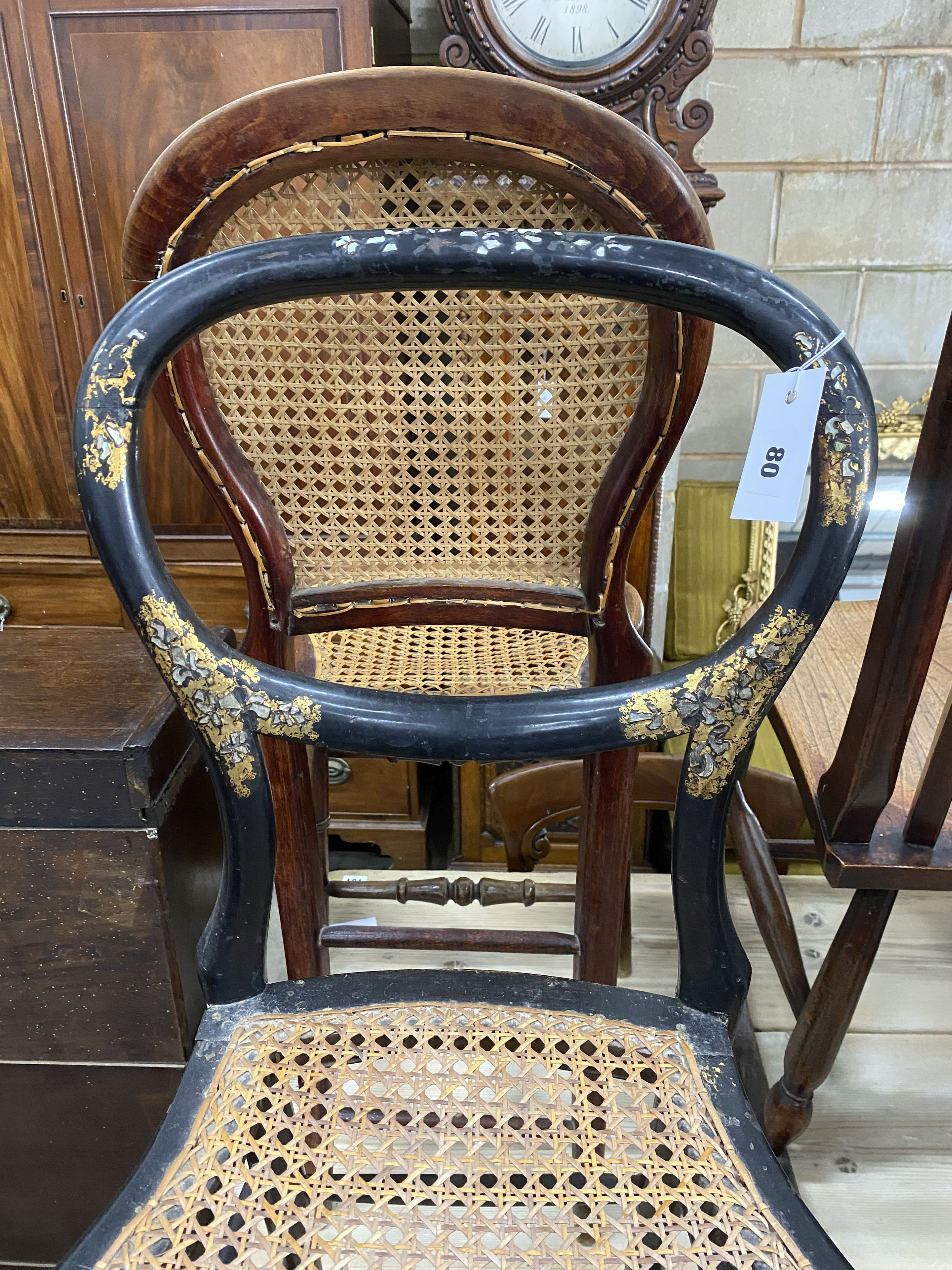 A Victorian elm and beech rocking chair together with two Victorian caned seat chairs